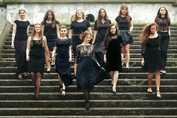 Girls in black dresses — Stock Photo, Image