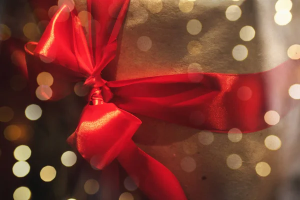 Gift box wrapped with ribbons — Stock Photo, Image