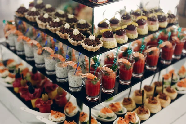 Delicious snacks on table — Stock Photo, Image