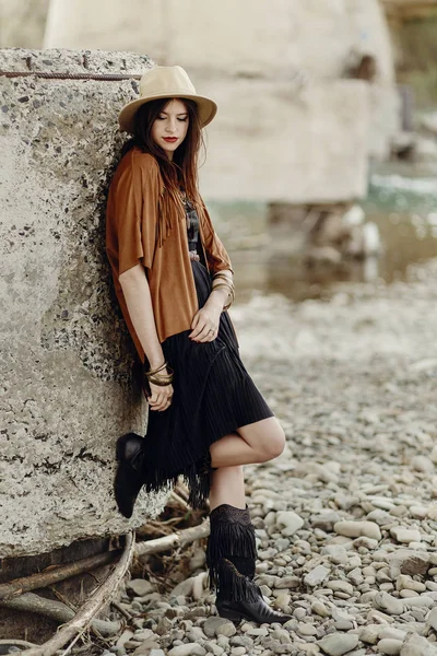 Woman in fringe poncho — Stock Photo, Image