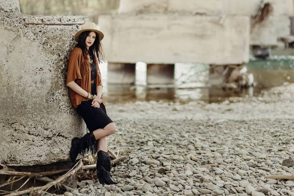 Woman in fringe poncho — Stock Photo, Image