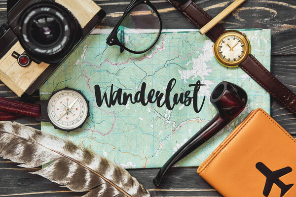 wanderlust text on map