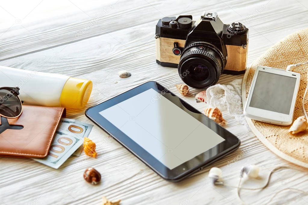 empty tablet screen and passport