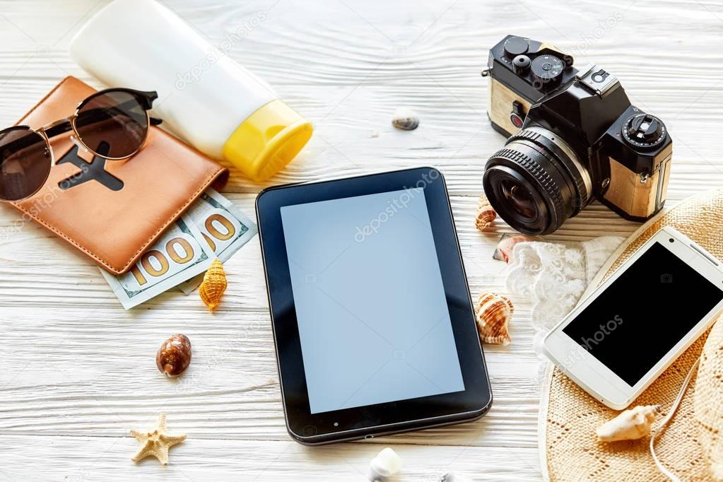 empty tablet screen and passport