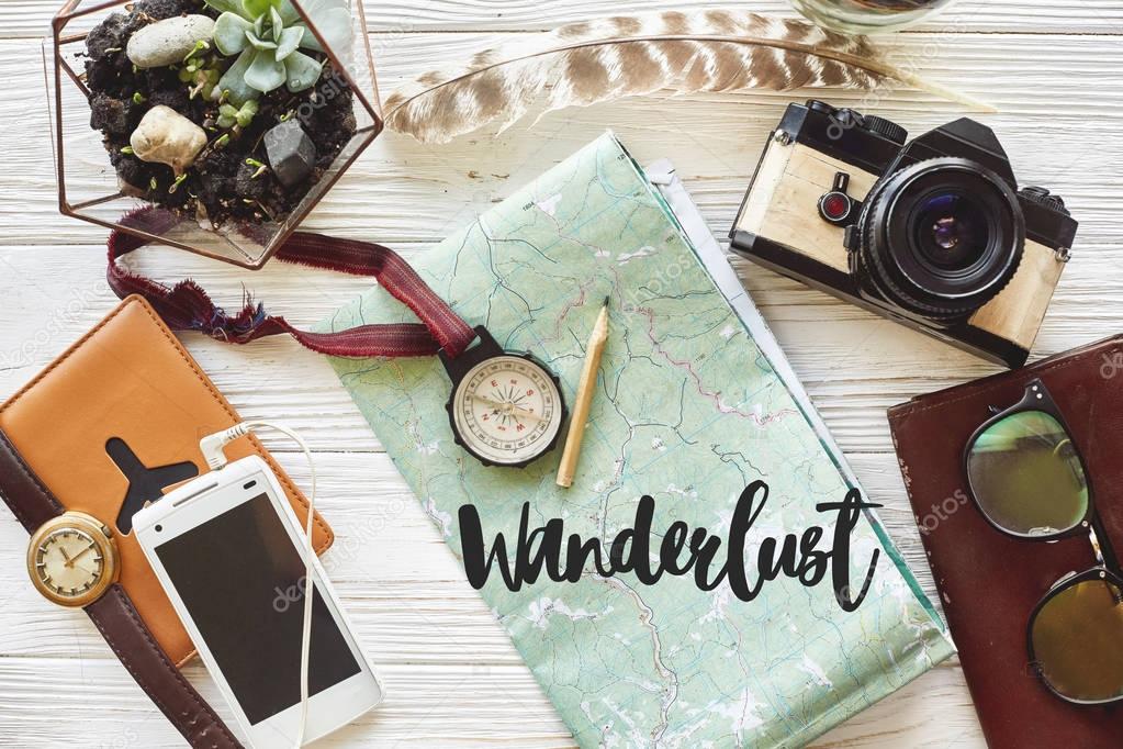 wanderlust text on map