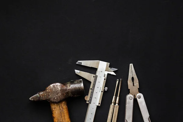 Tools on black background — Stock Photo, Image