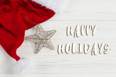 altın yıldız ve Noel Baba şapkası