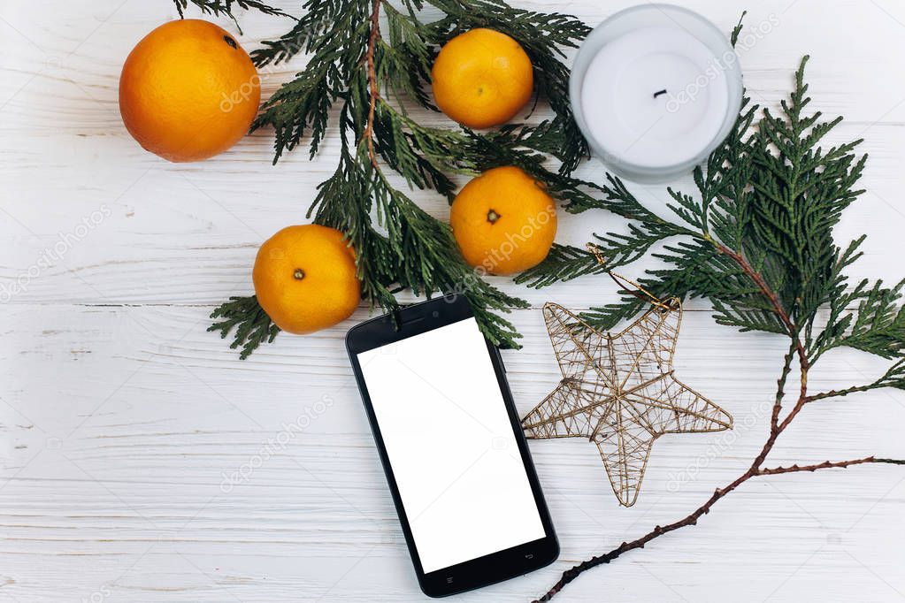phone, candle, oranges and star