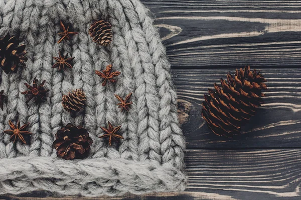 anise, cones and woolen hat