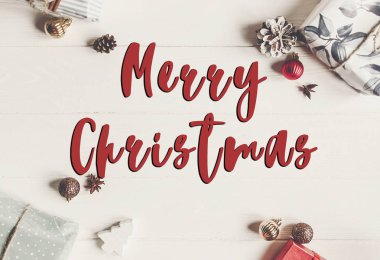 neşeli Noel metin, mevsimlik selamlar işareti kart. kaydırılan pres
