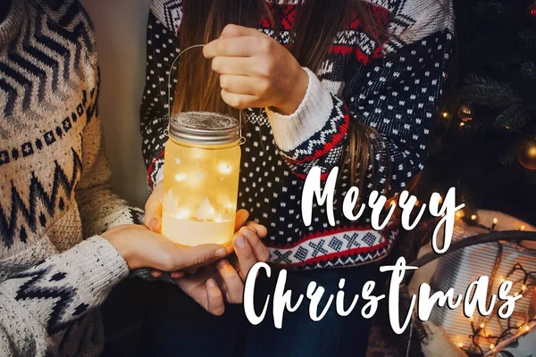 Merry Christmas Text Stylish Couple Sweaters Holding Lantern Light — Stock Photo, Image