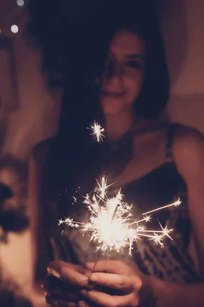 Smiling Brunette Girl Posing Burning Sparkler Bengal Light Indoors — Stock Photo, Image