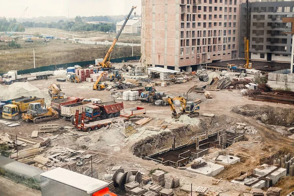 Buldozer, kazı, vinçler ve kum inşaat sitesi 