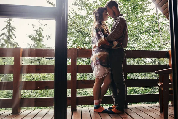 Stylish Hipster Couple Relaxing Porch Hugging Wooden Cottage Woods Mountains — Stock Photo, Image