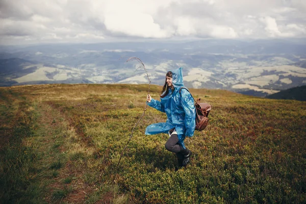 Traveler Hipster Girl Blue Raincoat Backpack Exploring Misty Mountains Space — Stock Photo, Image