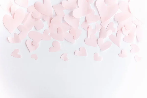 Bonito rosa pastel corações borda no fundo do papel branco com c — Fotografia de Stock
