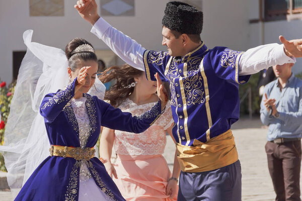 The national dance  young couple on the Crimean Tatar wedding.