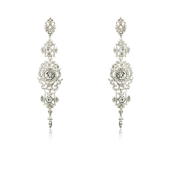 Pair of silver diamond earrings isolated on white — Stock Photo, Image