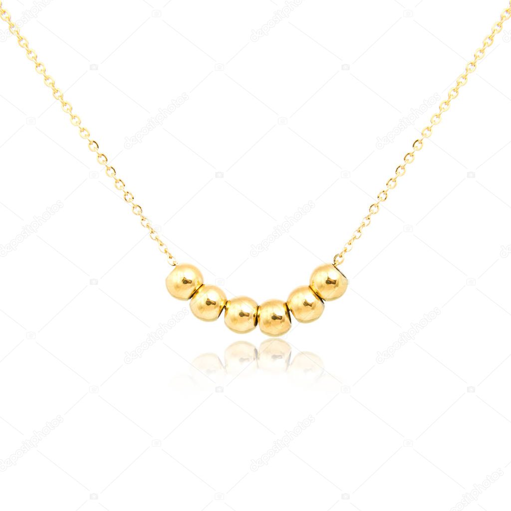 Golden pendant isolated on white