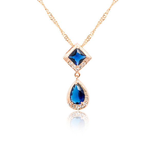 Sapphire pendant isolated on white