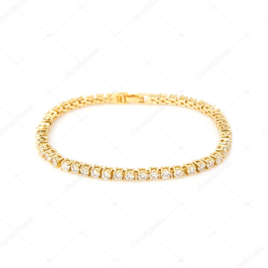 Golden diamond bracelet isolated on white