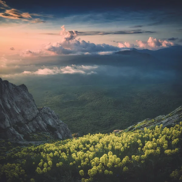 A view of mountain valley with colorful clouds. Instagram styliz — Stock Photo, Image