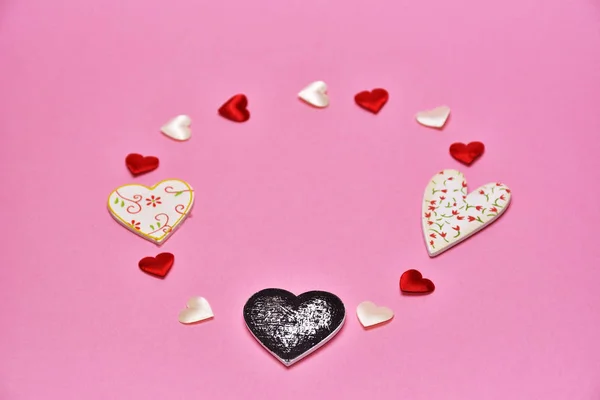 Hearts on pink background — Stock Photo, Image