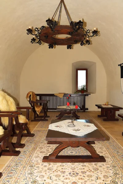 Medieval style room with old furniture — Stock Photo, Image