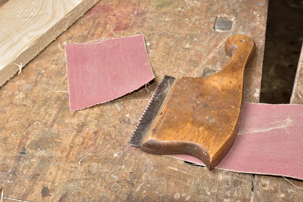 Carpenter working with plane on wooden — Stock Photo, Image