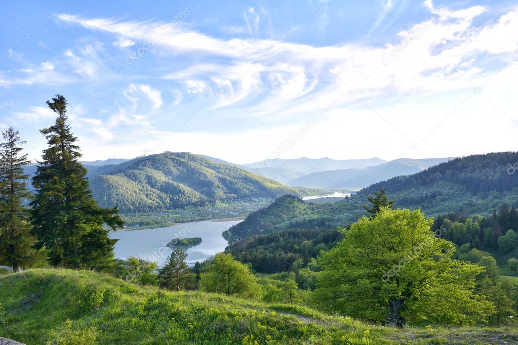 Summer Landscape with Green Field, lake and Blue Sky. Neamt, Roamania