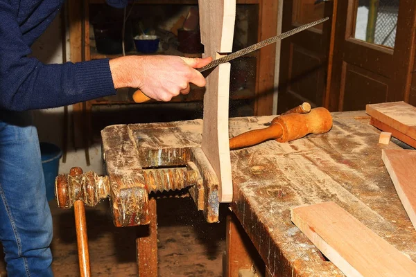 Carpenter working with plane on wooden background — Stock Photo, Image