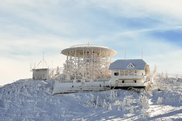 Building covered by frozen snow, Postavaru mountain, Romania