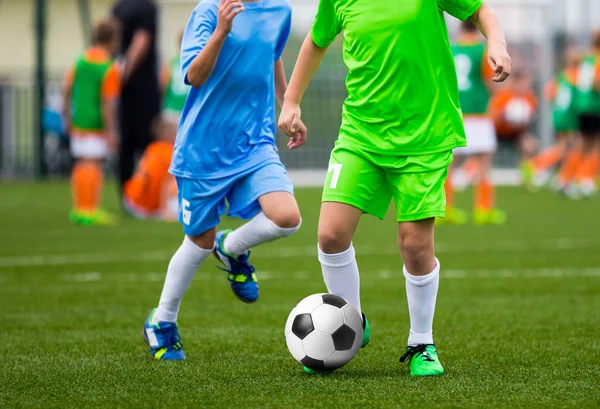 Youth Soccer Players. Boys Kicking Football Ball on the Field. F — Stock Photo, Image