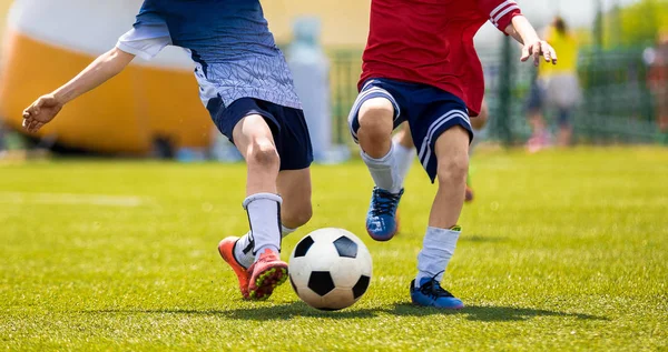 Young Soccer Players Competition. Boys Kicking Football Ball. Soccer Youth Teams Play Outdoor Tournament. Soccer Stadium in the Background — Stock Photo, Image