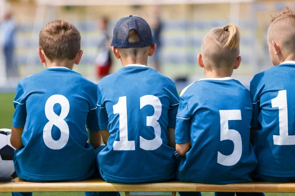 Happy Boys Sports Team Kids Football Players Wooden Bench Children — Stock Photo, Image