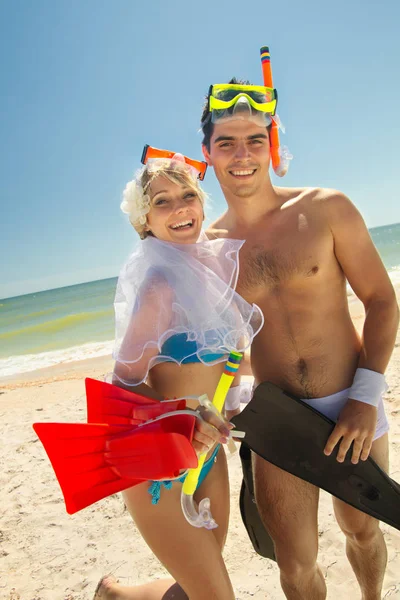 Newly-married couple on beach — Stock Photo, Image