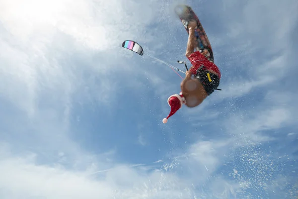 Christmas Santa Claus Professional Kiter Riding Sea Waves Beach — 스톡 사진