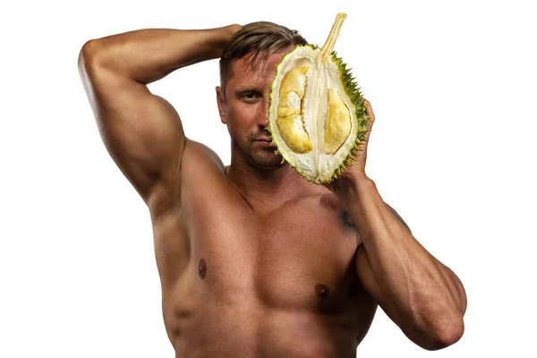 Mężczyzna Kulturysta Gospodarstwa Świeże Durian Ręku Jego Twarz — Zdjęcie stockowe