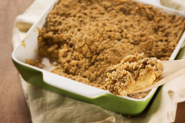 Apple Crisp or Apple Crumble with a Spoonful Removed — Stock Photo, Image