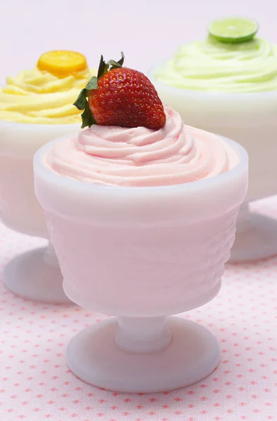 Three Flavors of Fruity Dessert Mousses on Pink — Stock Photo, Image