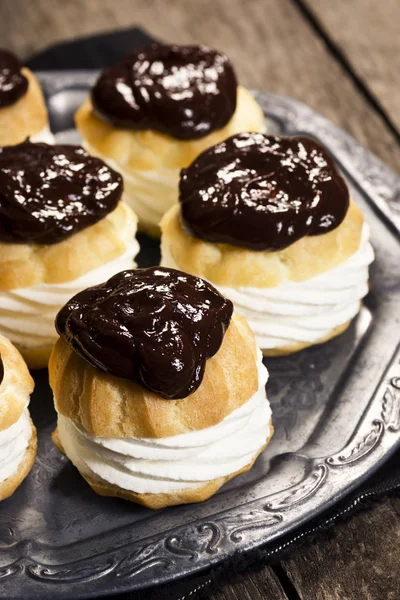Chocolate Covered Cream Puffs or Profiteroles — Stock Photo, Image
