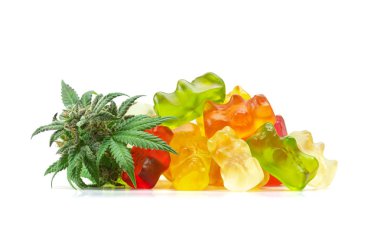 Gummy Bear Medical Marijuana Edibles, Candies Infused with CBD or THC, with Cannabis Bud Isolated on White Background clipart