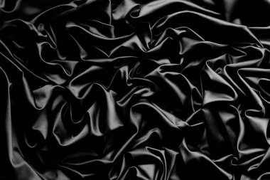 Siyah olarak soyut bir arkaplan. Örtülü kumaş.         