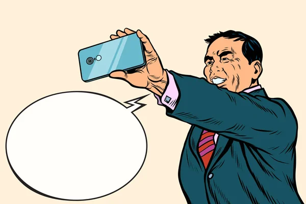 Asian businessman makes selfie — Stock Vector