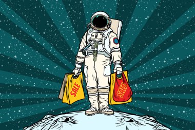 Satılık alışveriş torbaları ile yalnız retro astronot