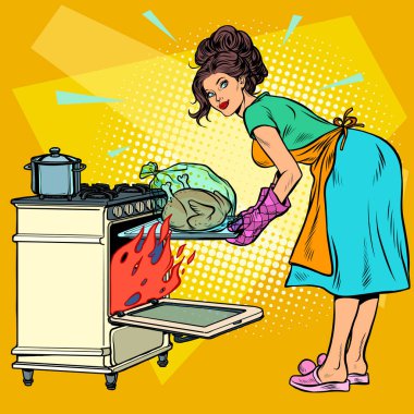 Kadın ev hanımı fırında kuş pişirir.