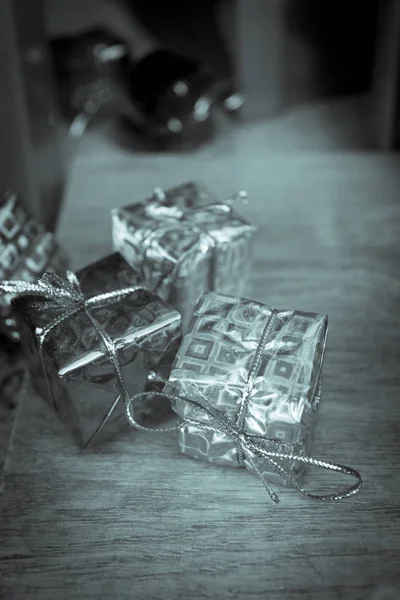 Boxes wrapped with shiny gift wrap