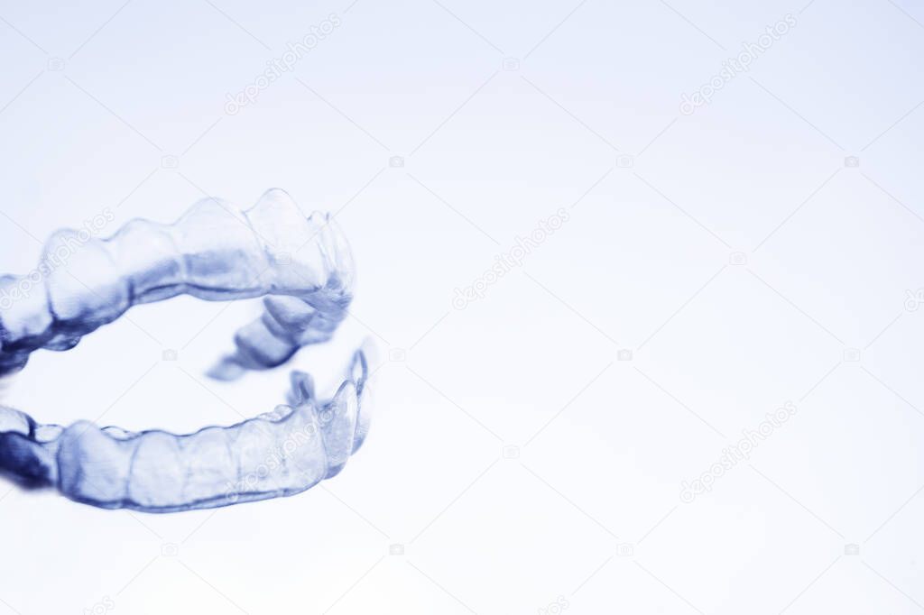 Transparent plastic splint for dental alignment