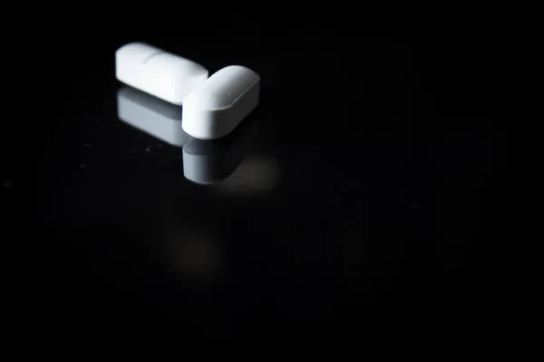 Woman Holding Generic White Medicine Pills — Stock Photo, Image