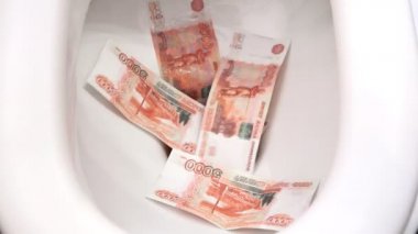 Throw money in the toilet and wash off with water